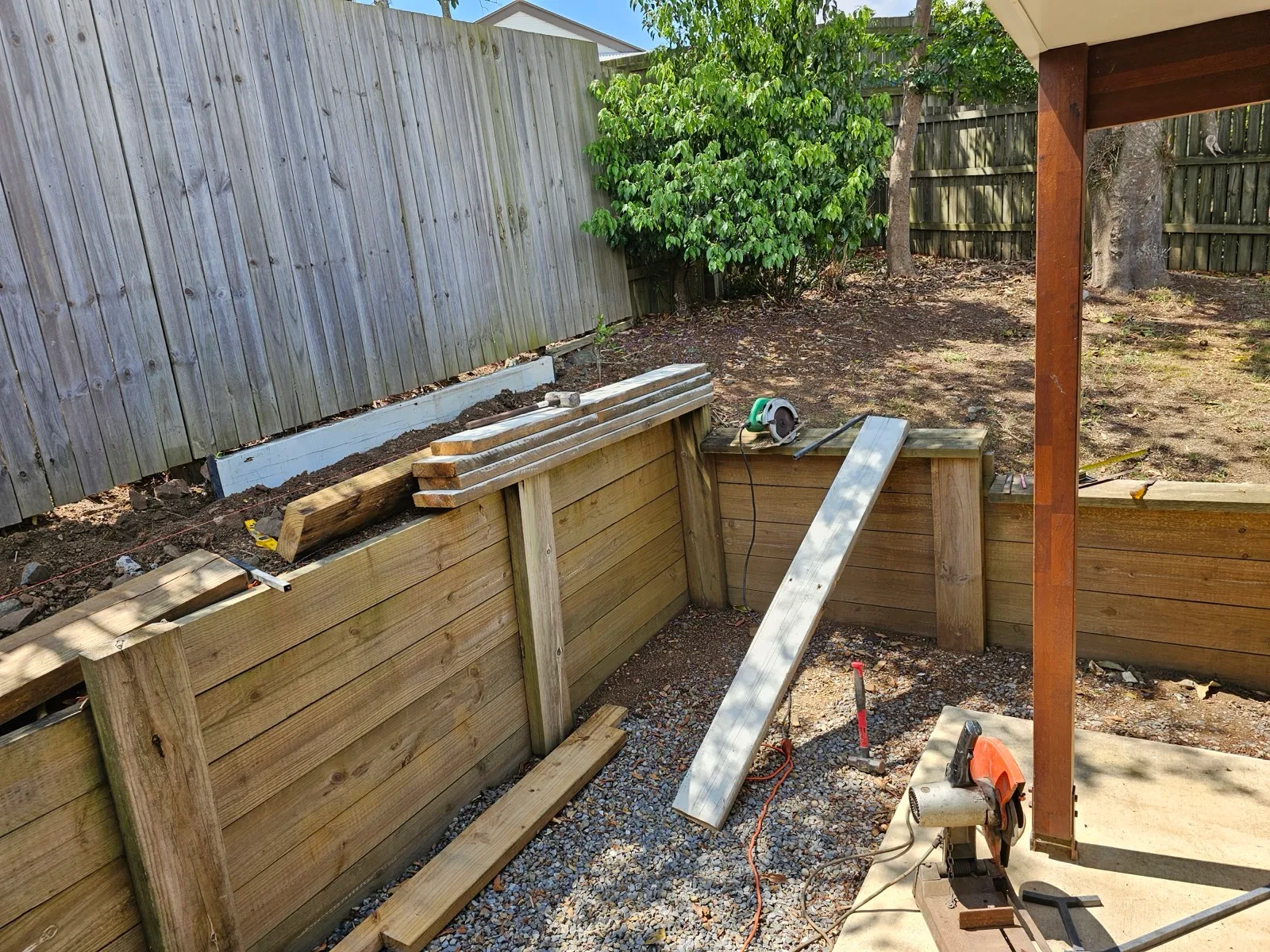 Retaining wall build in progress, backyard