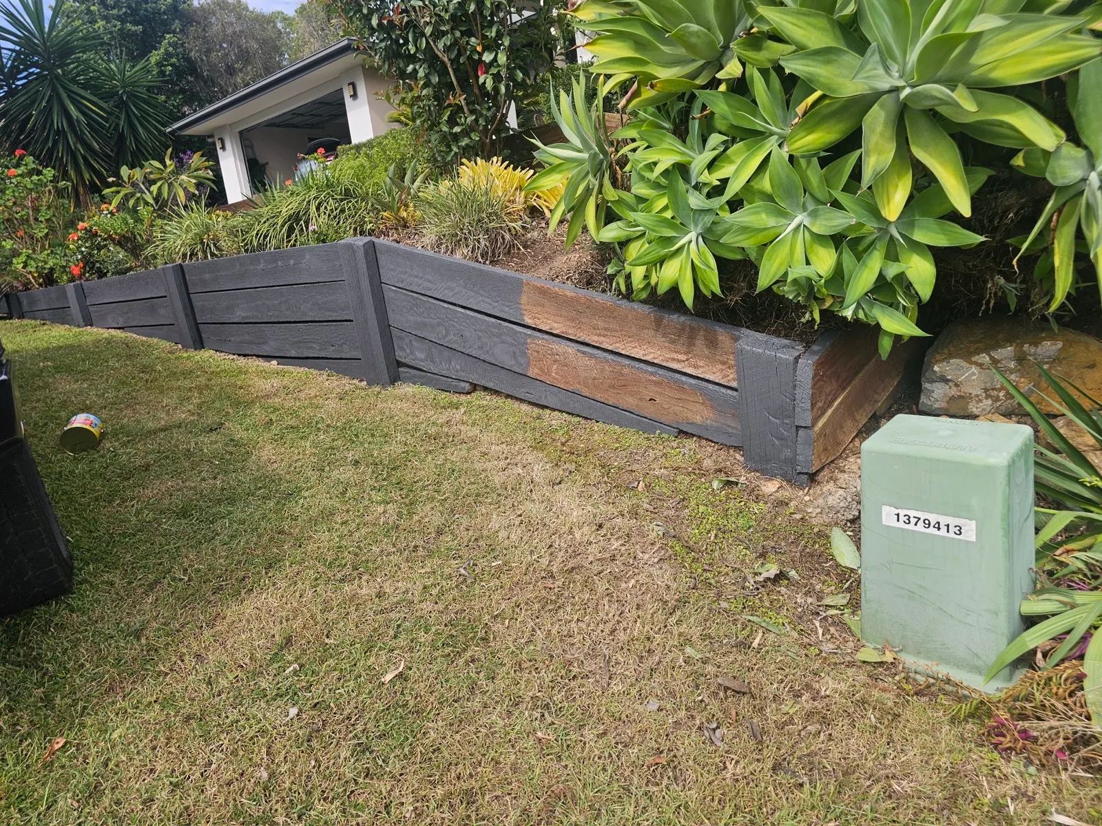 Timber sleeper retaining wall — before